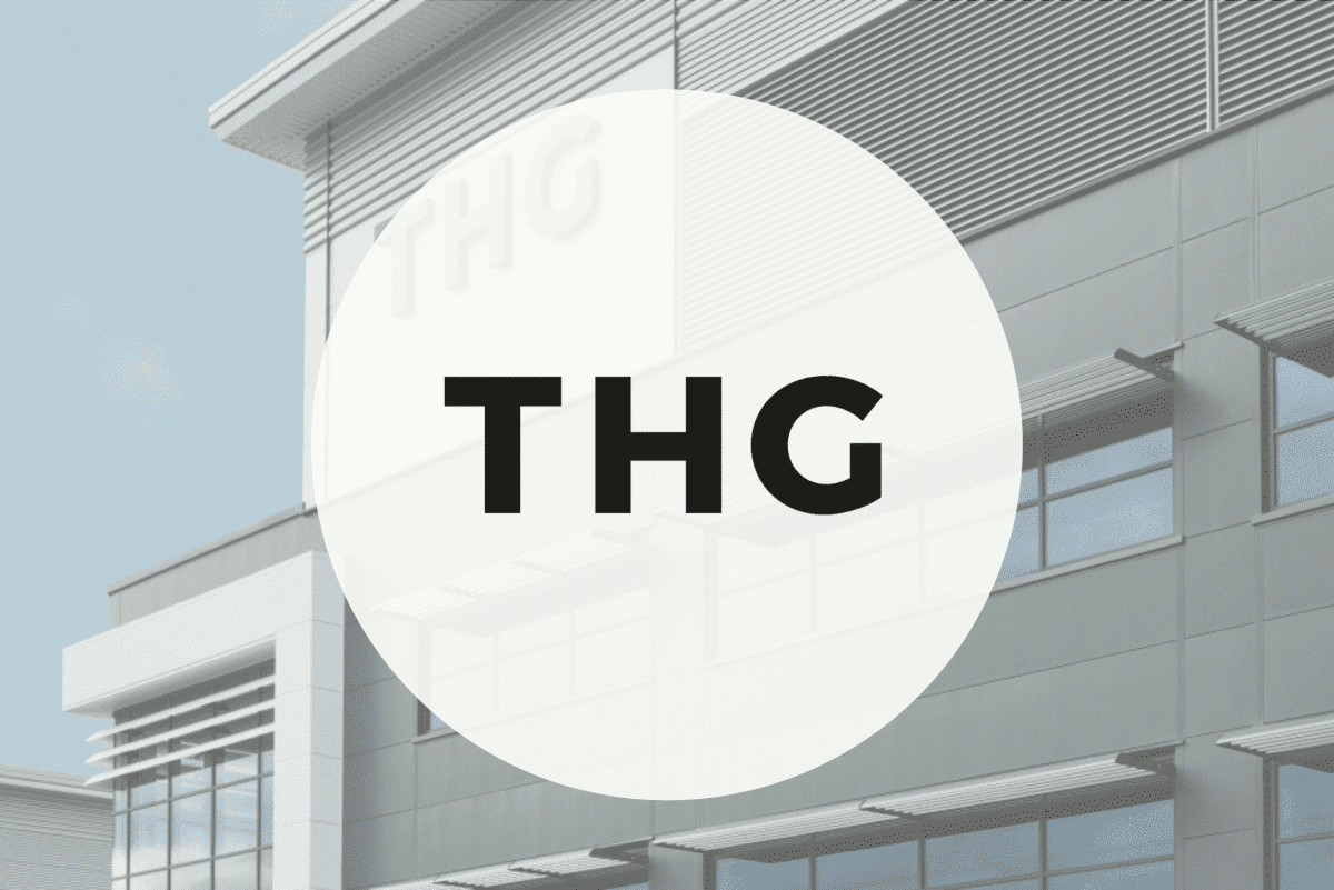 Black "THG" letters on a white circle, over a modern building background.